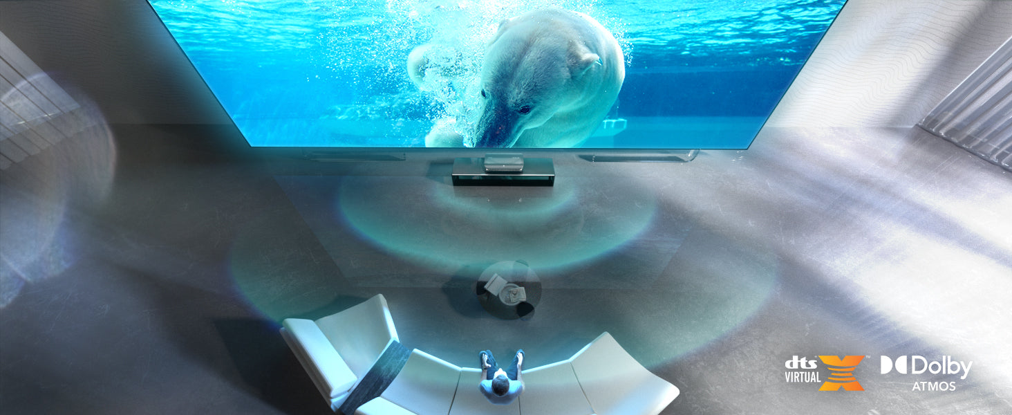 AWOL Vision 4K projector enhancing home audio with Dolby Atmos and DTS Virtual: X technologies, illustrated by a dolphin underwater scene.