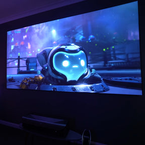LTV-3000 Pro 4K UHD triple laser projector displays high-definition video game graphics on a large screen.