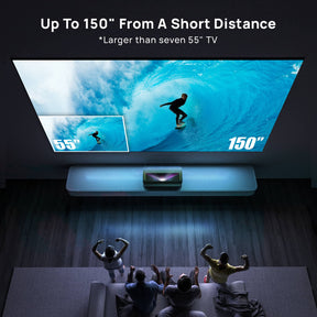AWOL Vision ultra-short throw projector displaying a massive 150-inch surfing scene, larger than seven 55" TVs, in a modern living room with excited audience.